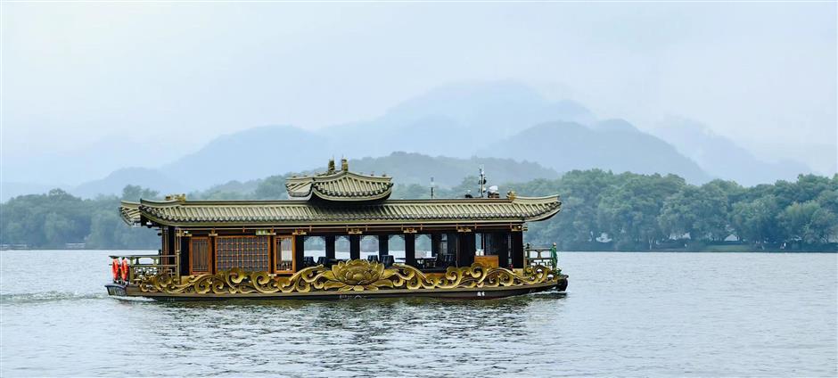 Picture-perfect: Antique-style boats launched on West Lake